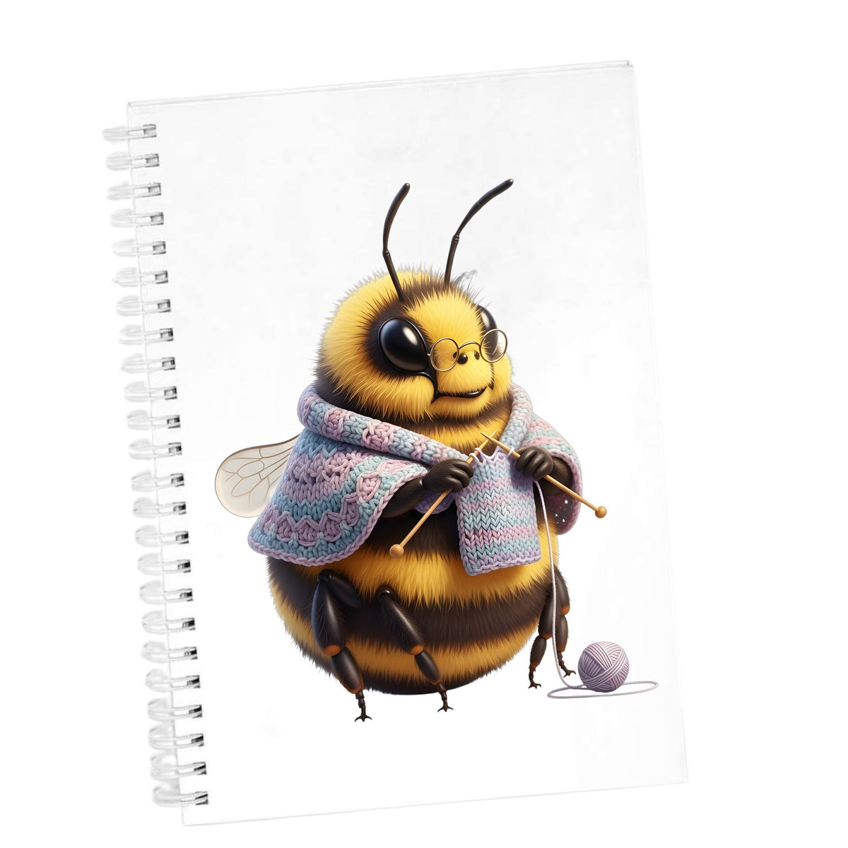 Bee Knitting In Shawl UV DTF sticker applied to the cover of a white spiral journal