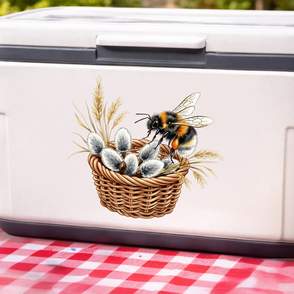 Bumble Bee On Basket Of Pussy Willow UV DTF sticker applied to a white cooler on a red gingham cloth