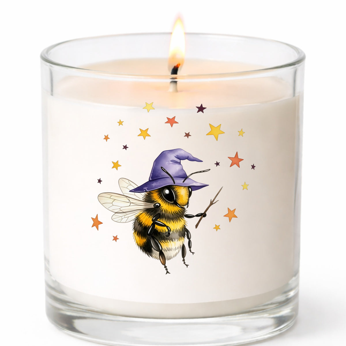 Bee Wizard With Stars UV DTF sticker applied to a white candle in a clear glass jar
