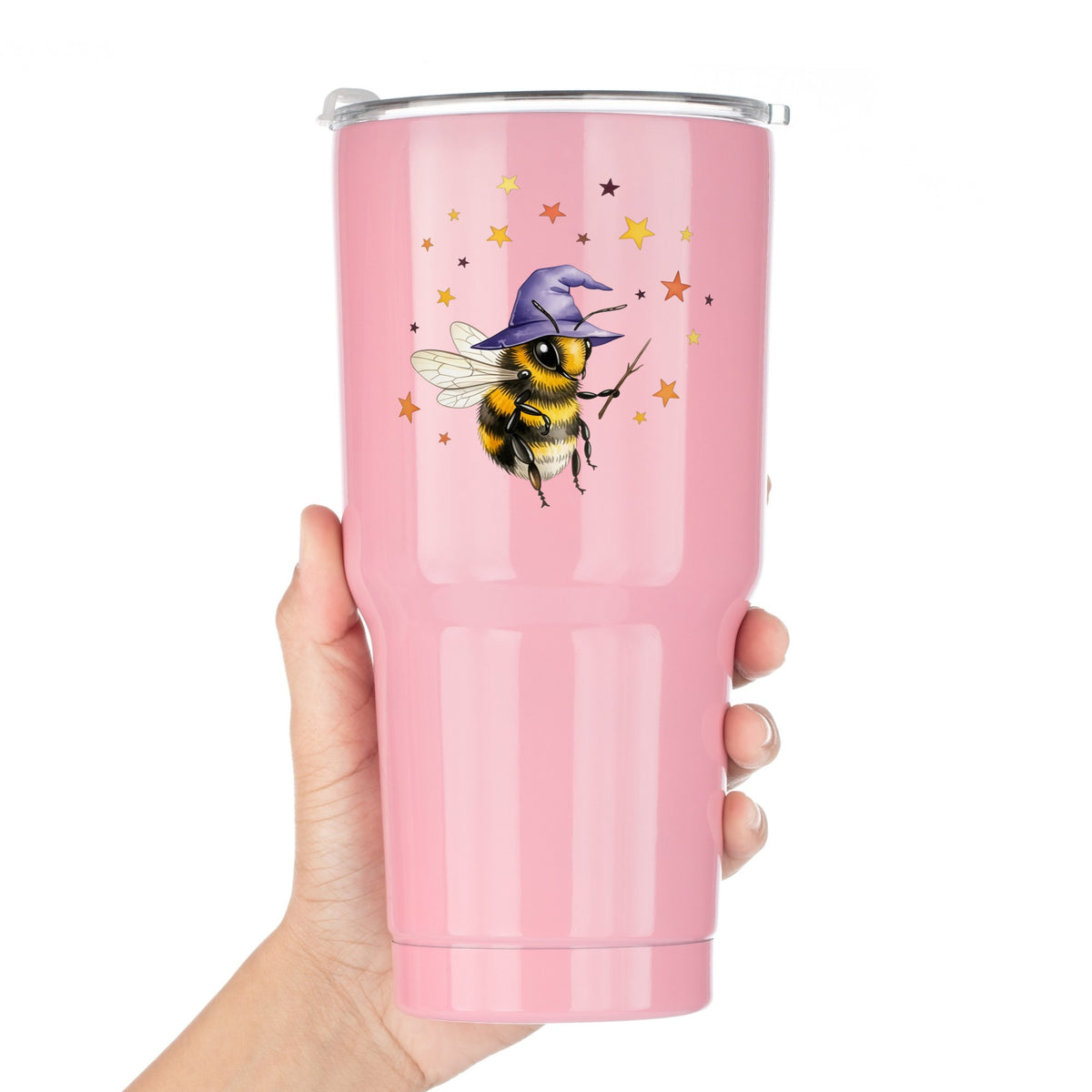 Bee Wizard With Stars UV DTF sticker applied to a pink tumbler held against a white background