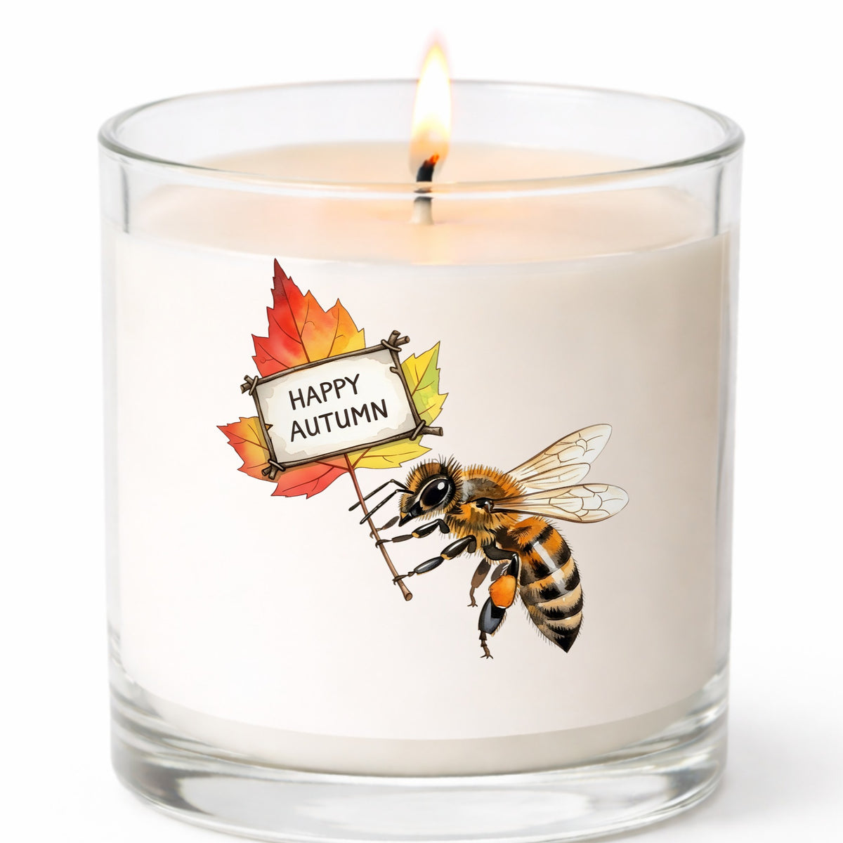 Honeybee Holding Happy Autumn Sign UV DTF sticker applied to a white candle in a clear glass jar