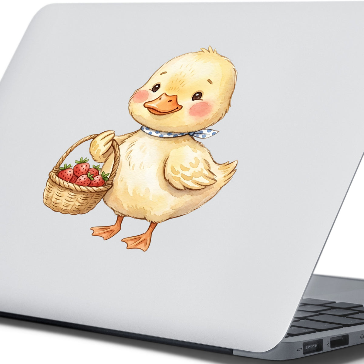 Duckling With Strawberry Basket UV DTF sticker applied to the lid of a silver laptop