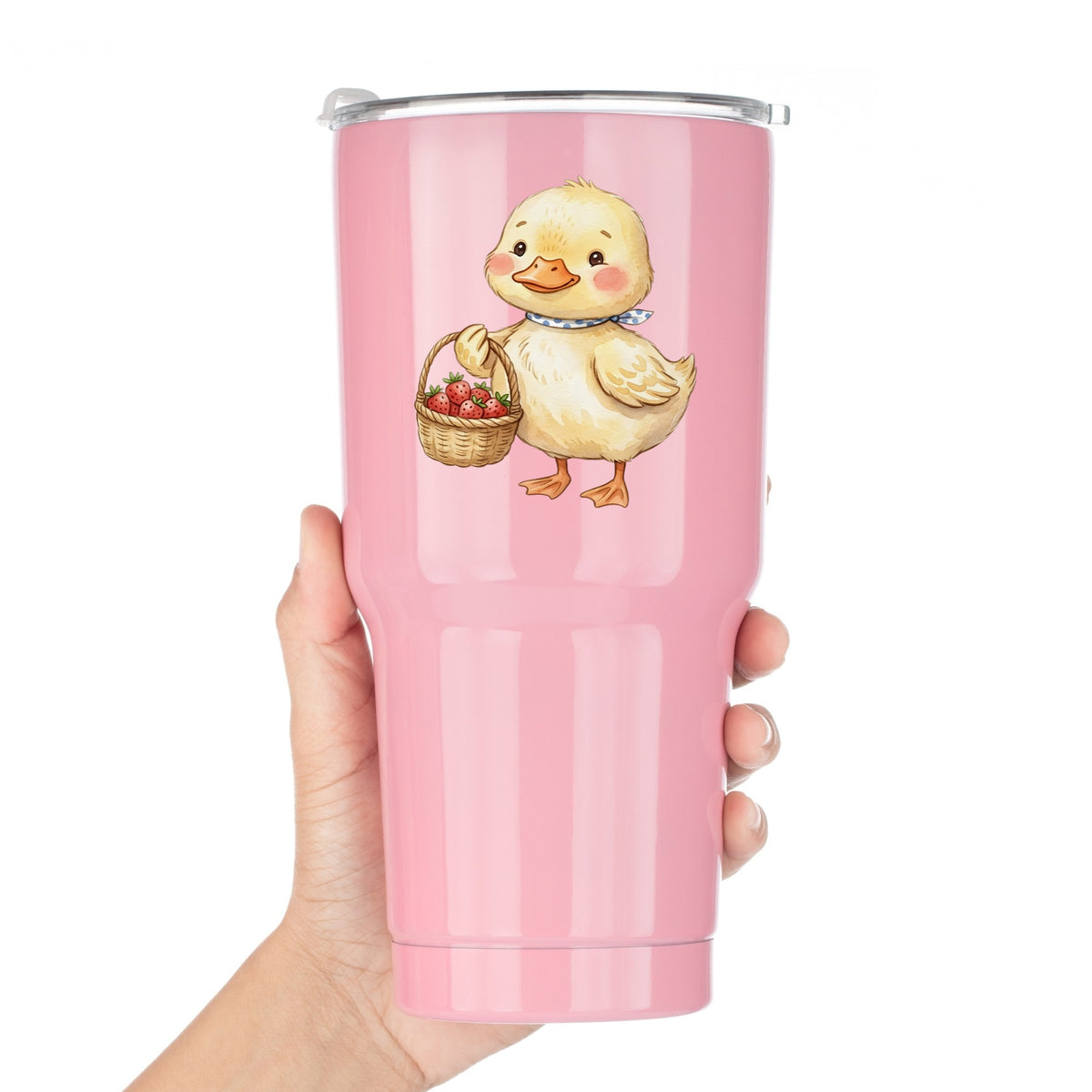 Duckling With Strawberry Basket UV DTF sticker applied to a pink tumbler held against a white background