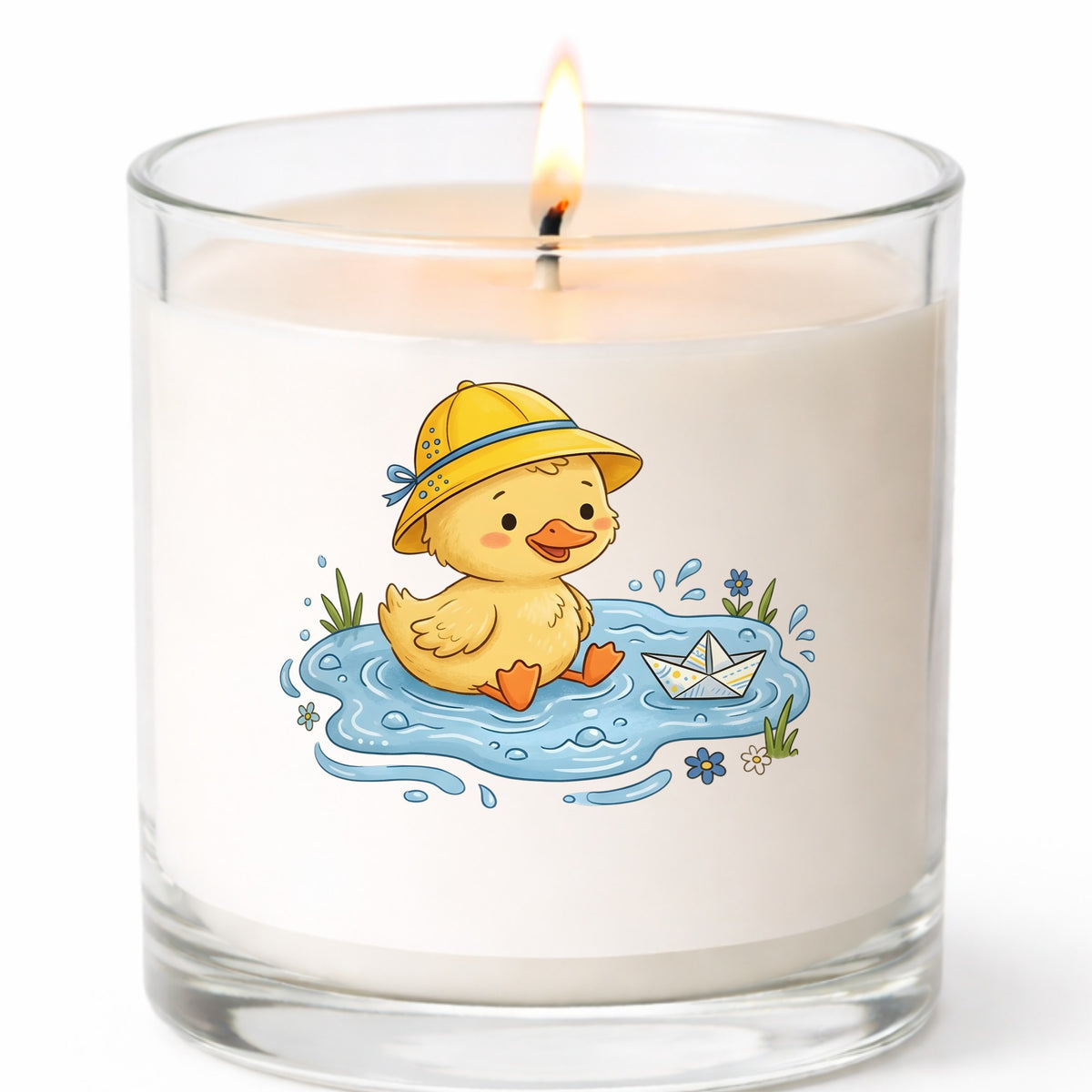 Duckling In Rain Hat In Puddle UV DTF sticker applied to a white candle in a clear glass jar