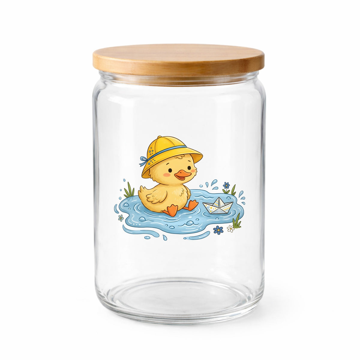 Duckling In Rain Hat In Puddle UV DTF sticker applied to a clear glass jar with a wooden lid