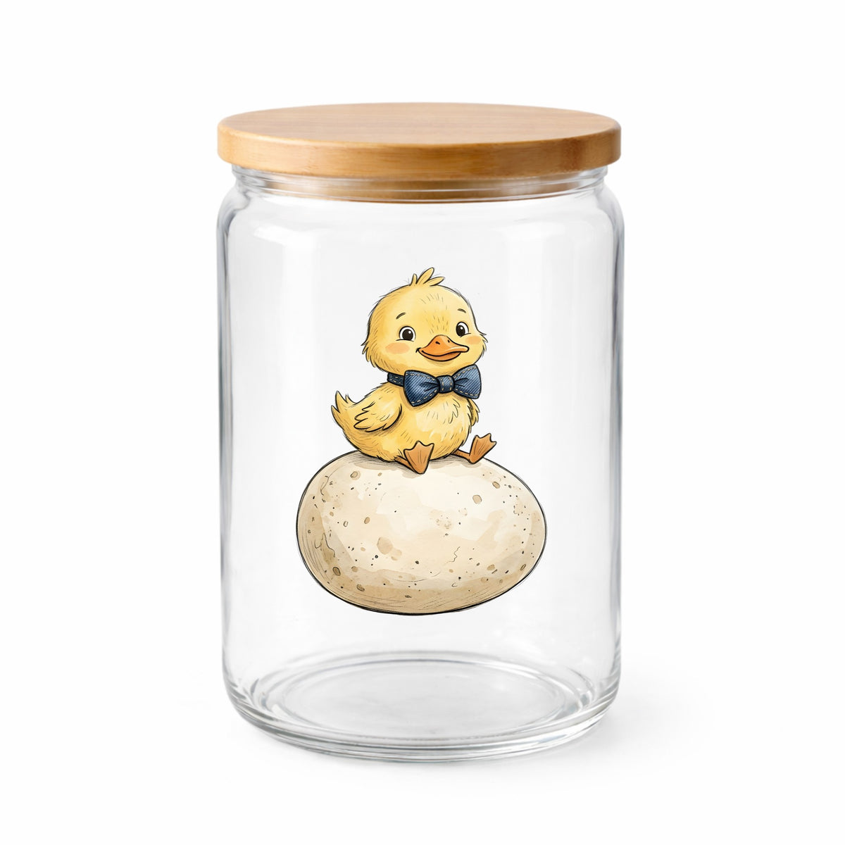 Duckling On Giant Egg UV DTF sticker applied to a clear glass jar with a wooden lid