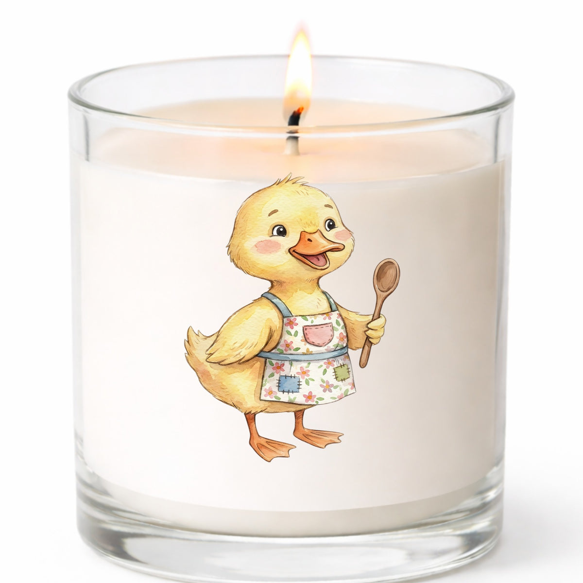 Duckling In Apron With Wooden Spoon UV DTF sticker applied to a white candle in a clear glass jar