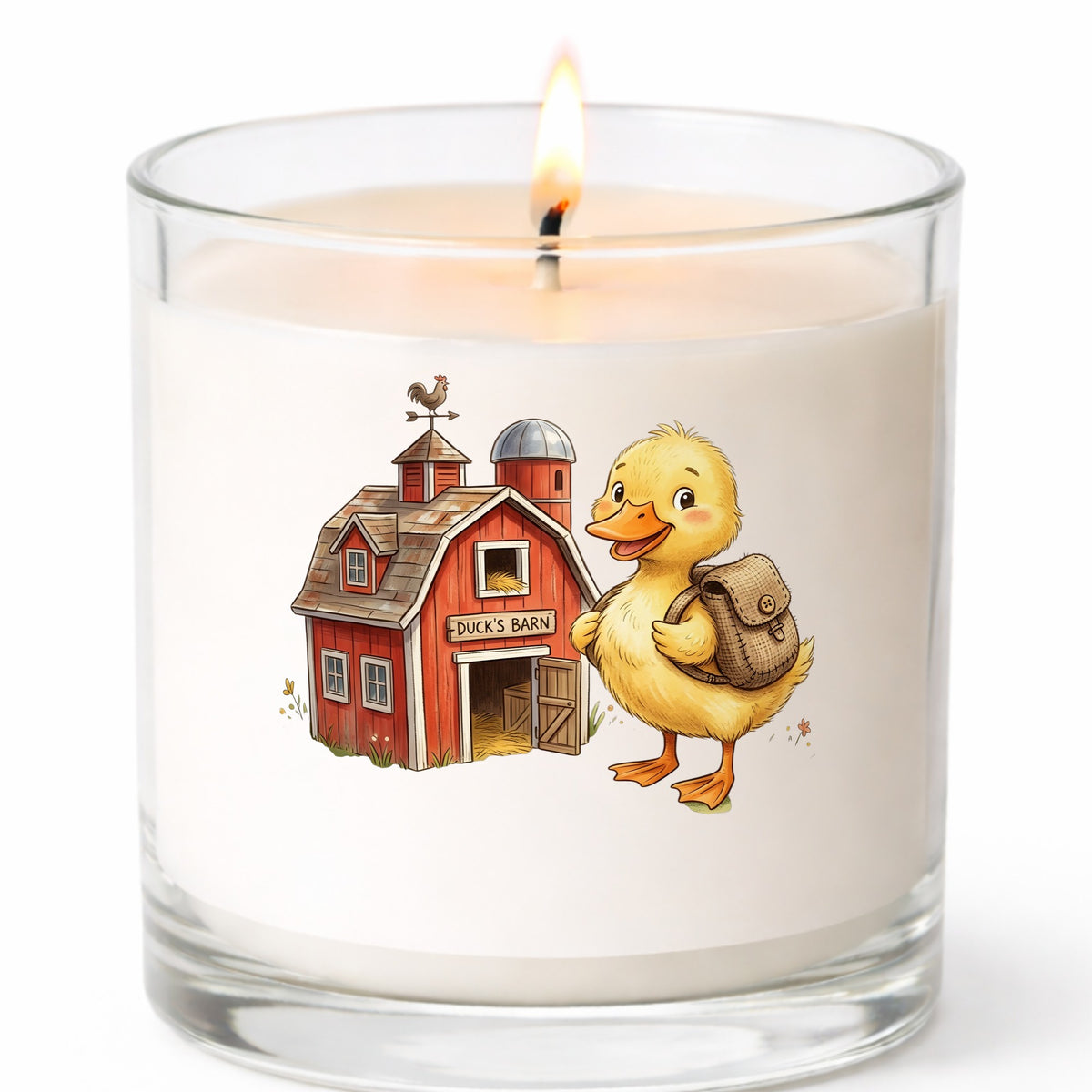 Duckling With Backpack And Red Barn UV DTF sticker applied to a white candle in a clear glass jar