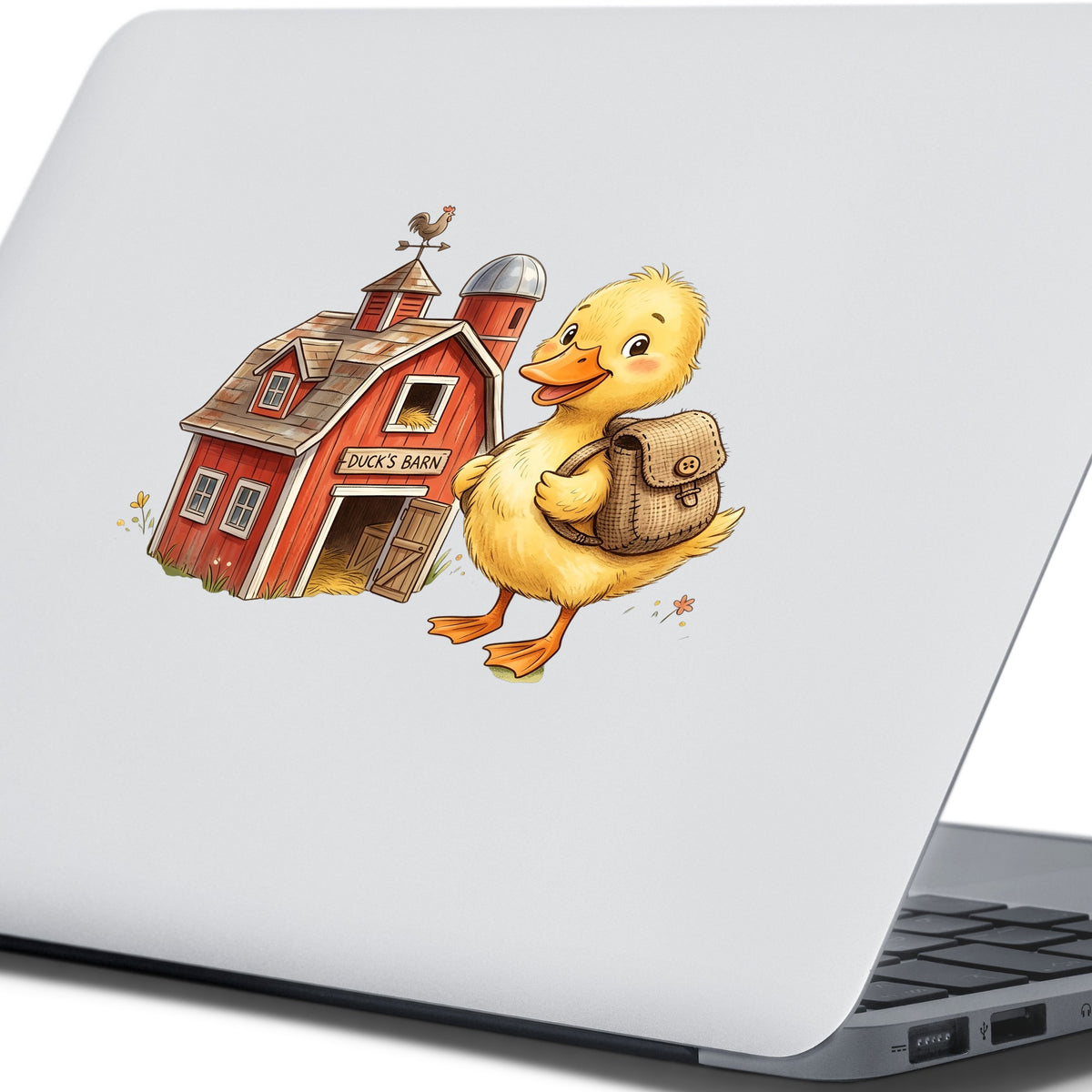 Duckling With Backpack And Red Barn UV DTF sticker applied to the lid of a silver laptop