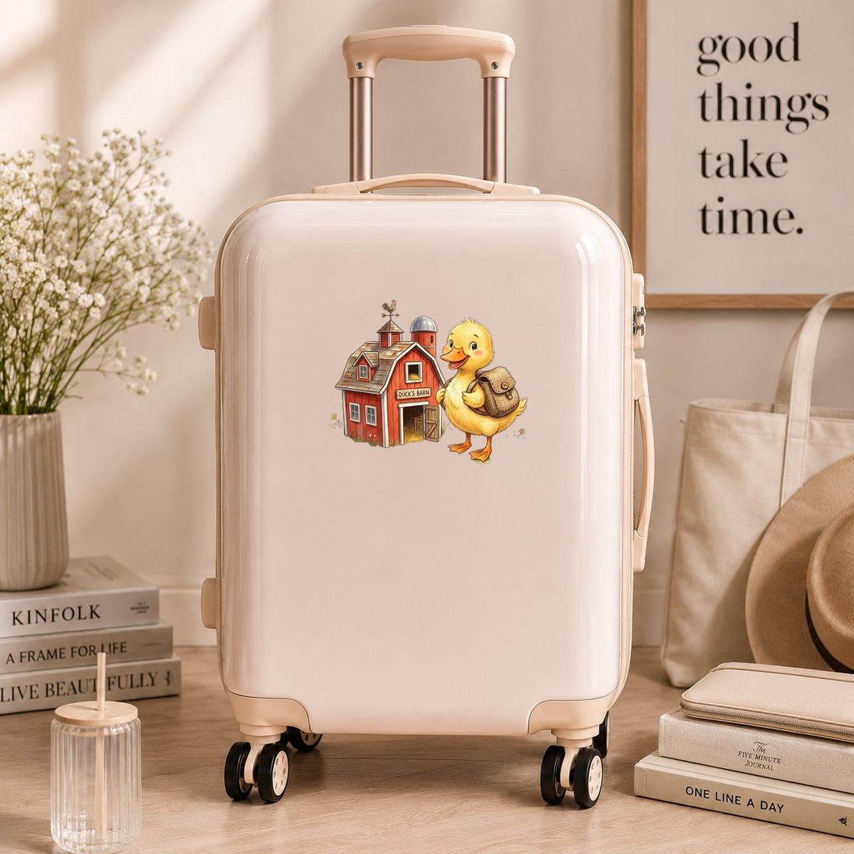 Duckling With Backpack And Red Barn UV DTF sticker applied to a cream carry-on suitcase