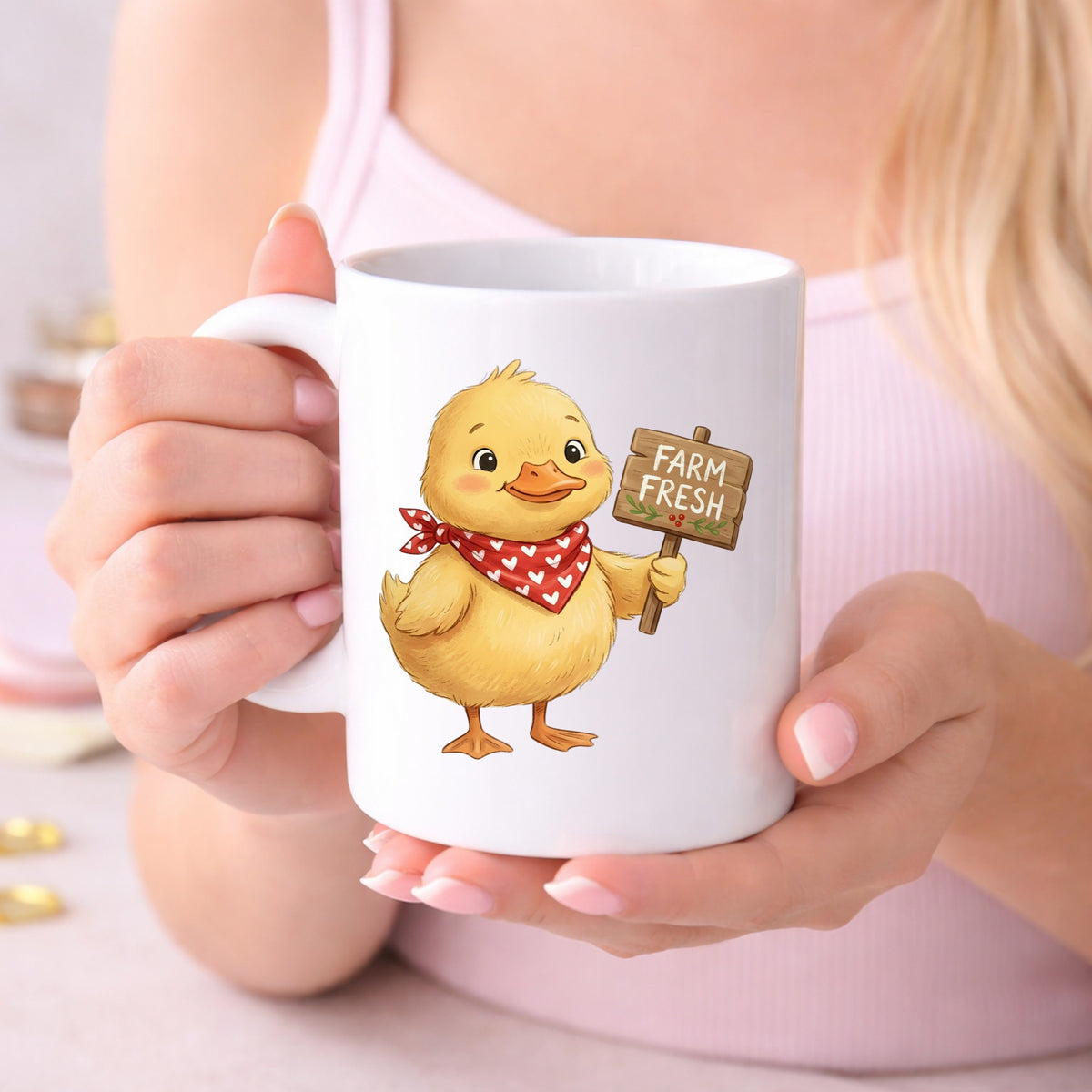 Duckling With Farm Fresh Sign UV DTF sticker applied to a white coffee mug held in both hands