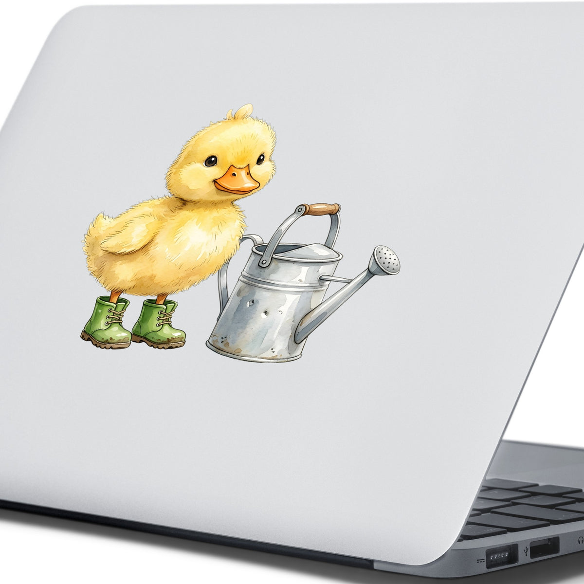 Duckling In Boots With Watering Can UV DTF sticker applied to the lid of a silver laptop