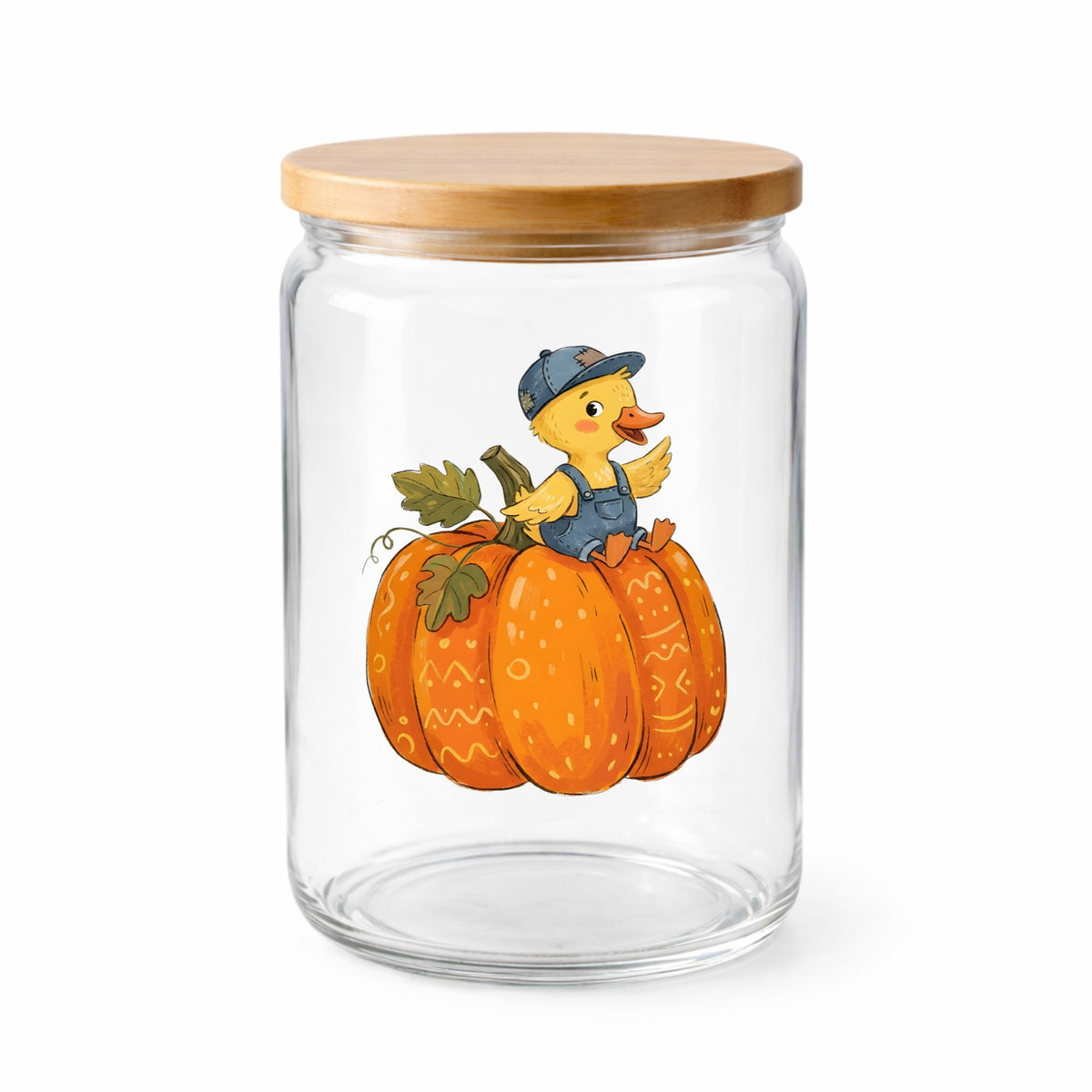 Duckling In Overalls On Pumpkin UV DTF sticker applied to a clear glass jar with a wooden lid