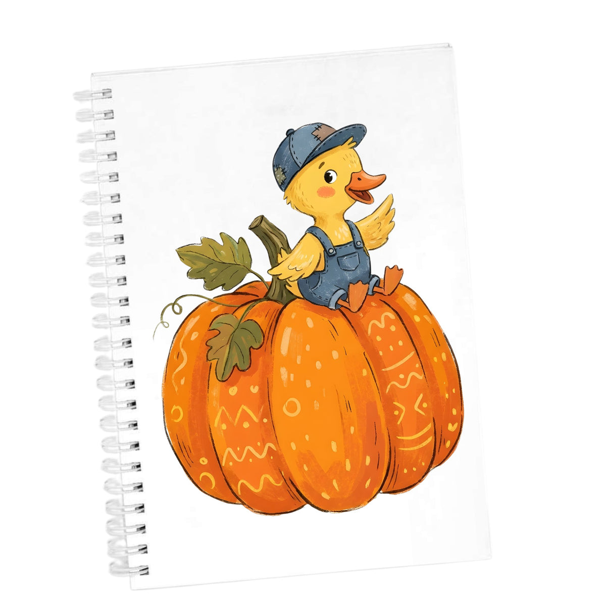 Duckling In Overalls On Pumpkin UV DTF sticker applied to the cover of a white spiral journal