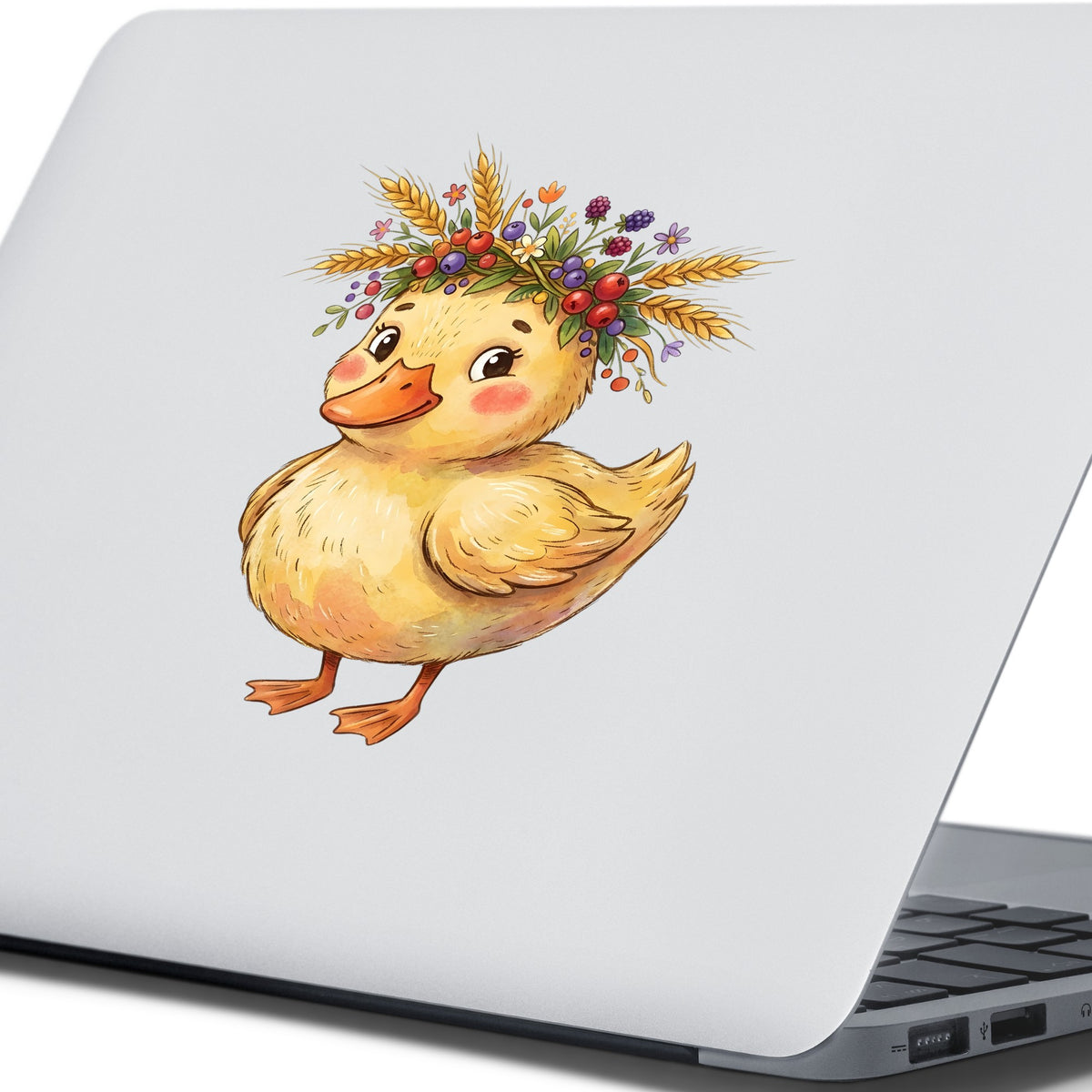 Duckling With Wheat And Berry Crown UV DTF sticker applied to the lid of a silver laptop