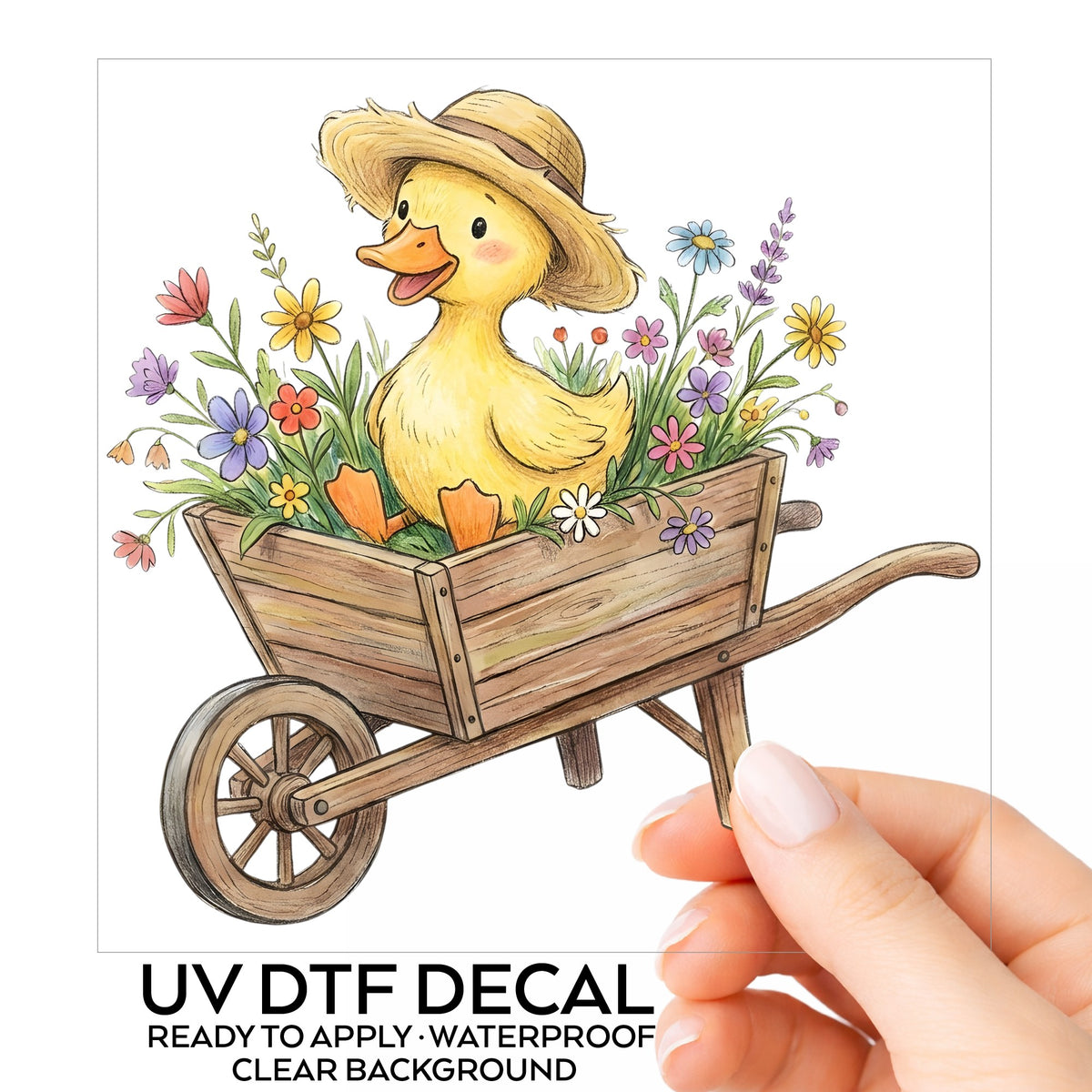 Duckling In Wheelbarrow Of Flowers UV DTF sticker on its backing card, held in hand