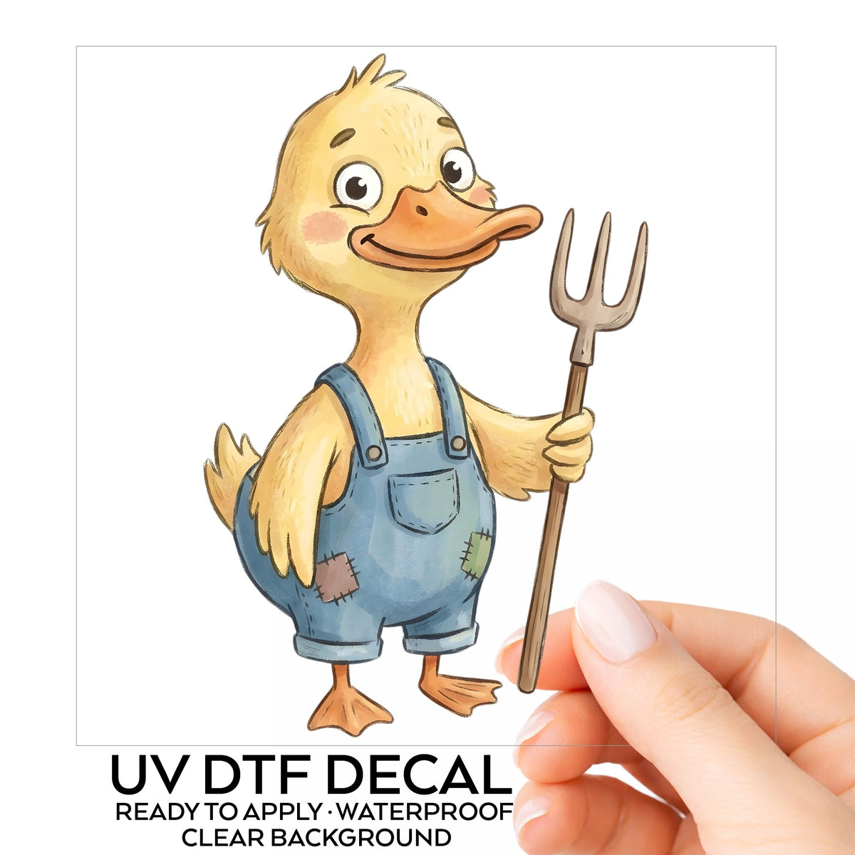 Duck In Overalls Holding Pitchfork UV DTF sticker on its backing card, held in hand