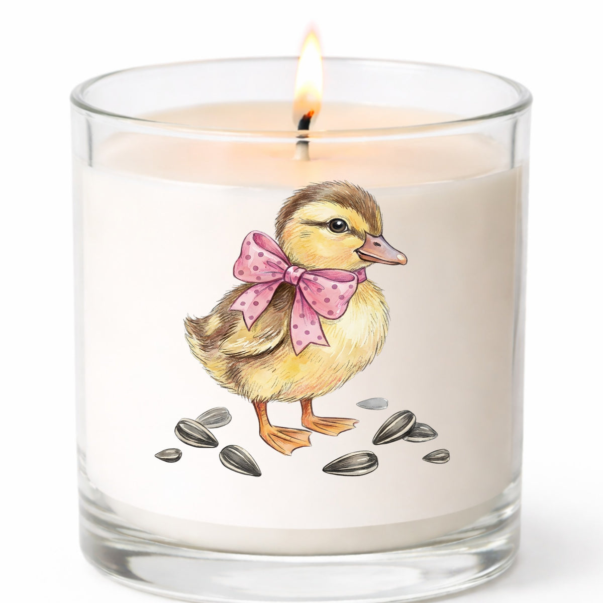 Brown Duckling With Pink Bow UV DTF sticker applied to a white candle in a clear glass jar