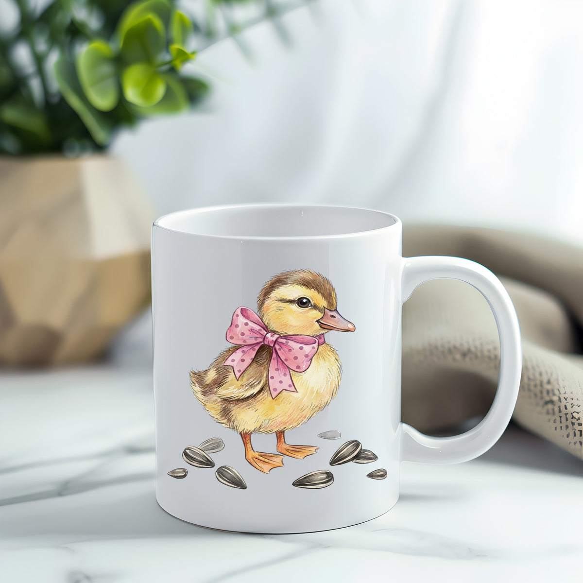 Brown Duckling With Pink Bow UV DTF sticker applied to a white coffee mug