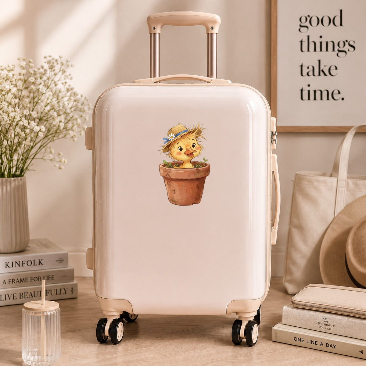 Fluffy Duckling In Flower Pot UV DTF sticker applied to a cream carry-on suitcase