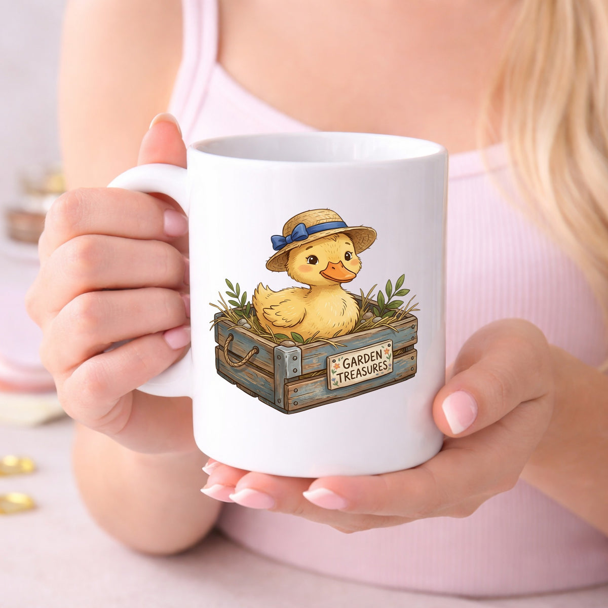 Duckling In Garden Treasures Crate UV DTF sticker applied to a white coffee mug held in both hands
