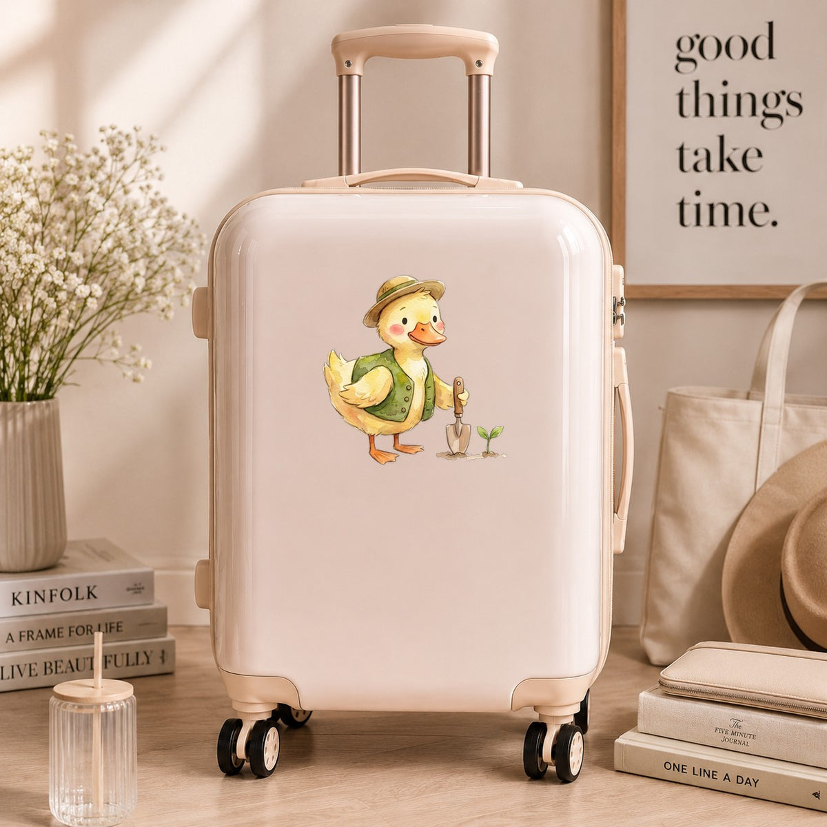 Duck In Green Vest With Garden Trowel UV DTF sticker applied to a cream carry-on suitcase