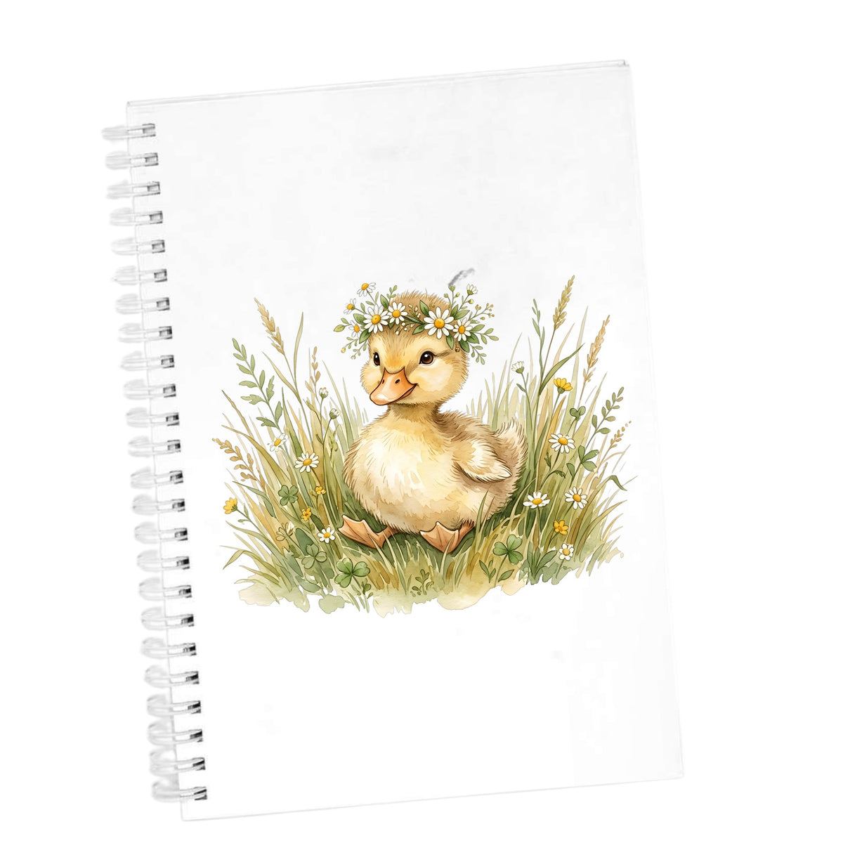 Duckling With Daisy Crown In Grass UV DTF sticker applied to the cover of a white spiral journal