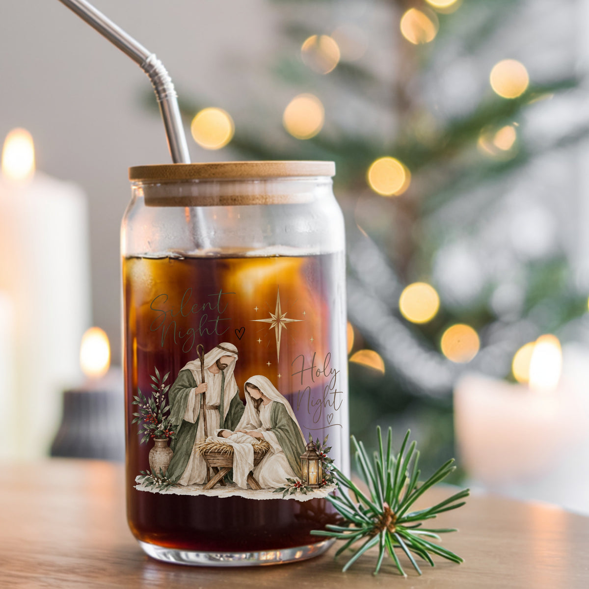 Silent Night Nativity Scene UV DTF sticker applied to a glass can cup of iced coffee with a straw