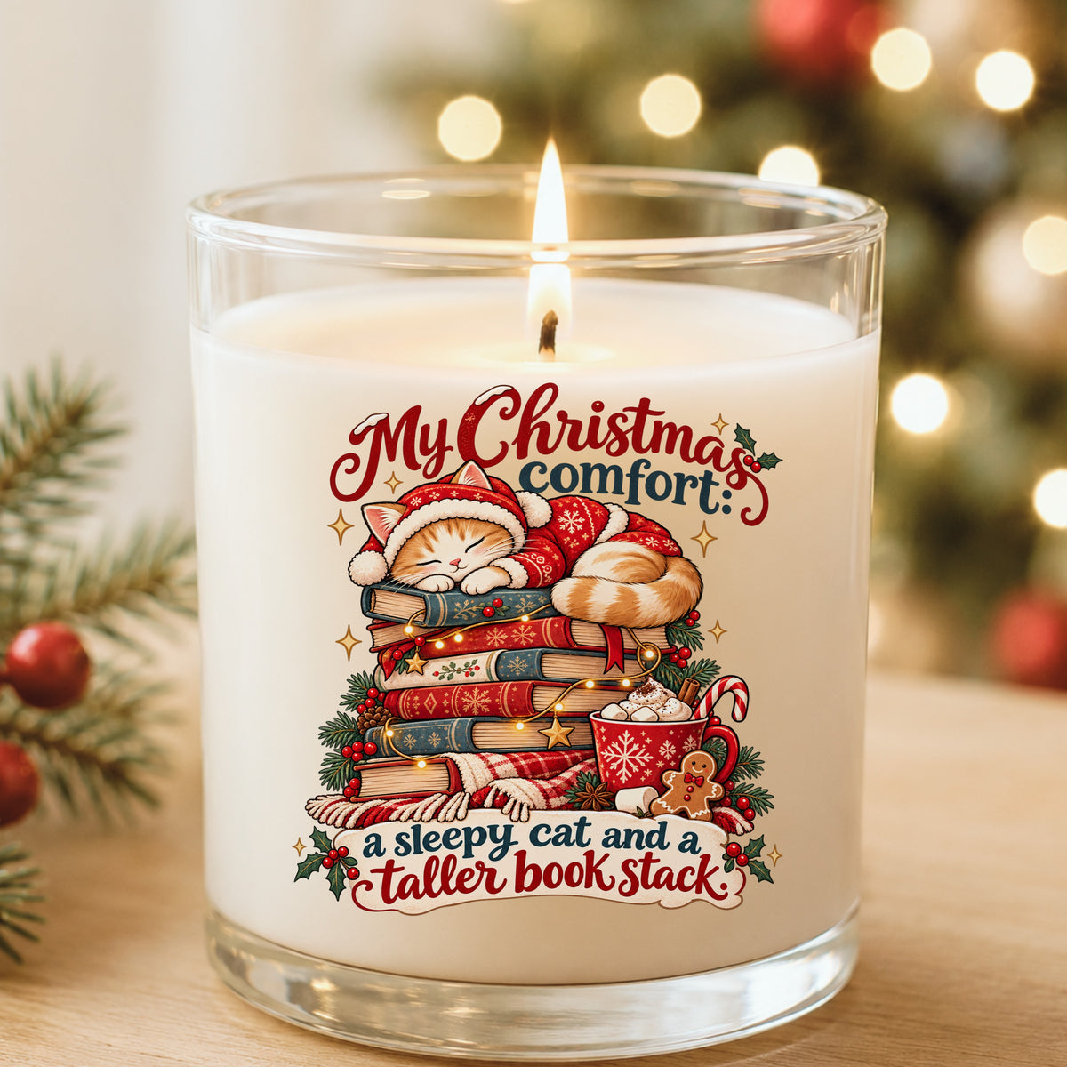 Sleepy Christmas Cat On Book Stack UV DTF sticker applied to a white candle in a glass holder near Christmas lights