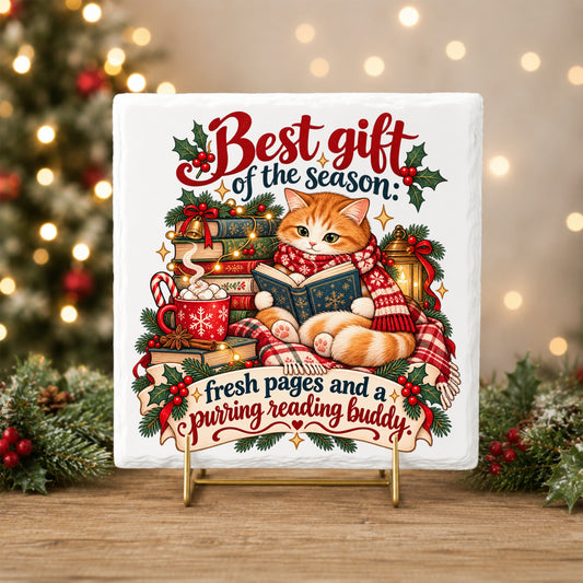 Christmas Cat Reading A Book UV DTF sticker applied to a white tile on a gold stand