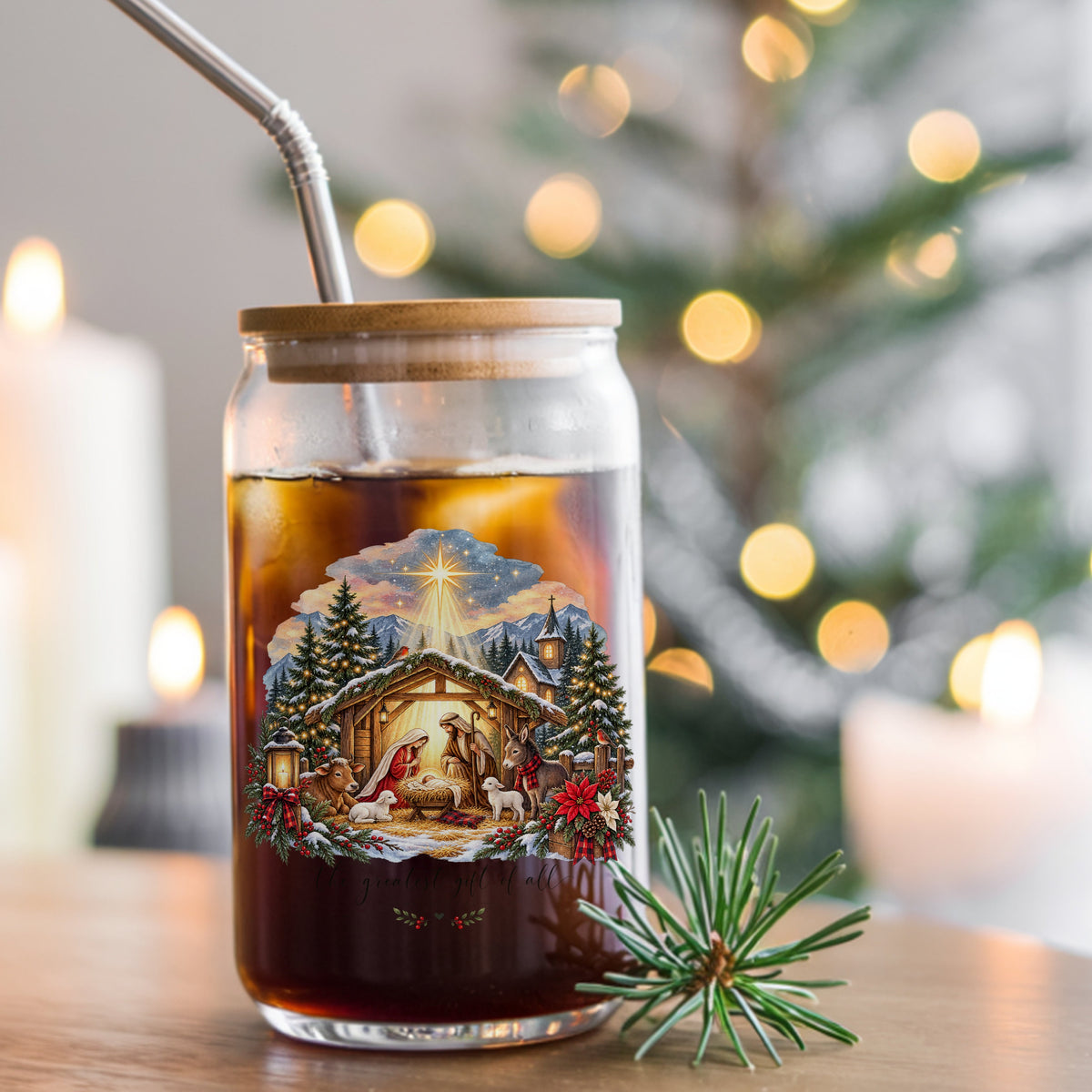 Greatest Gift Of All Nativity Stable UV DTF sticker applied to a glass can cup of iced coffee with a straw