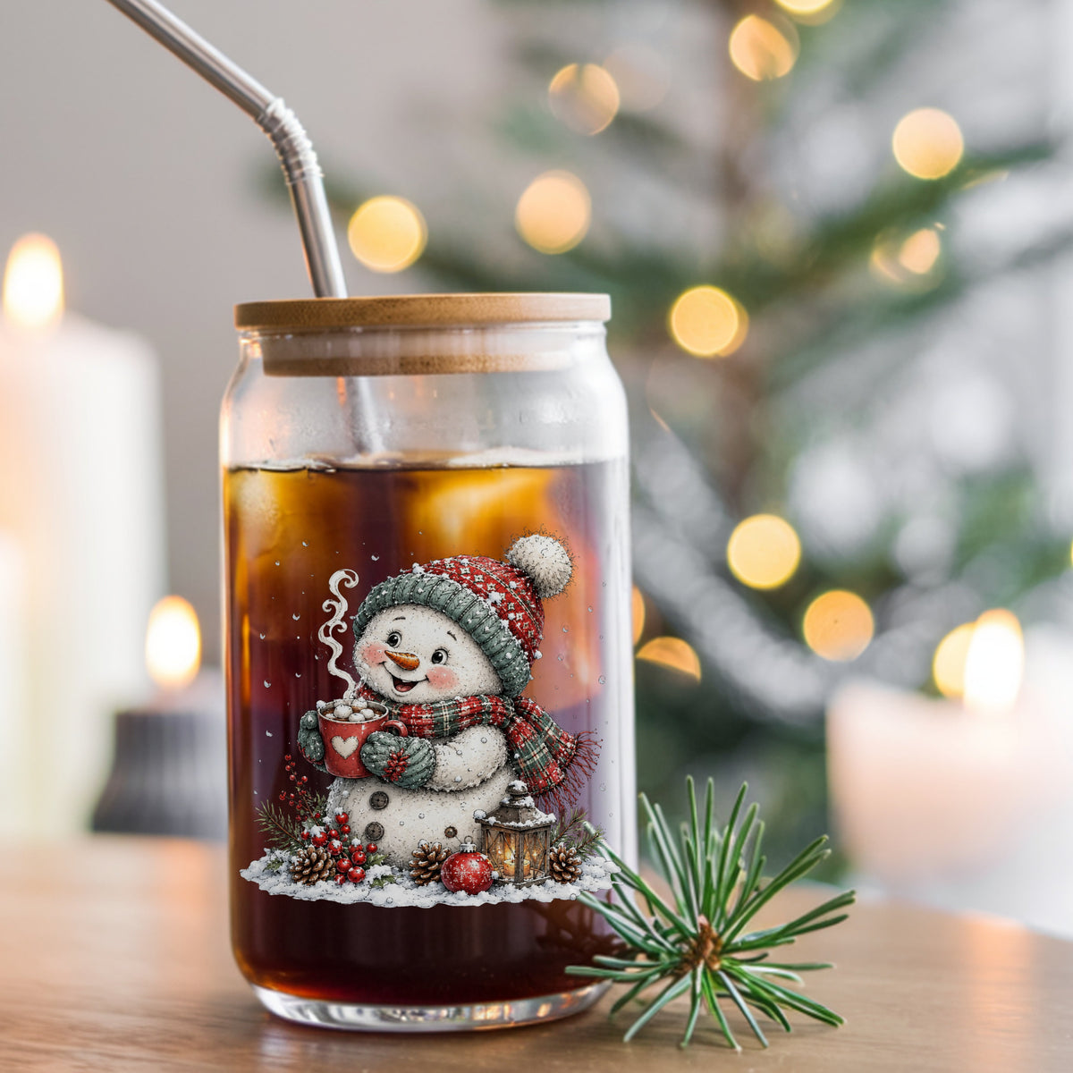 Hot Cocoa Snowman With Heart Mug UV DTF sticker applied to a glass can cup of iced coffee with a straw