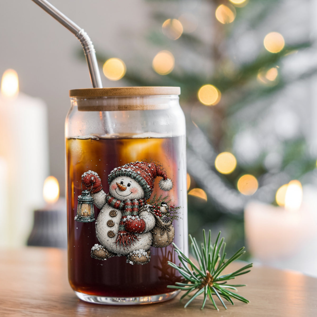 Walking Snowman With Burlap Sack UV DTF sticker applied to a glass can cup of iced coffee with a straw
