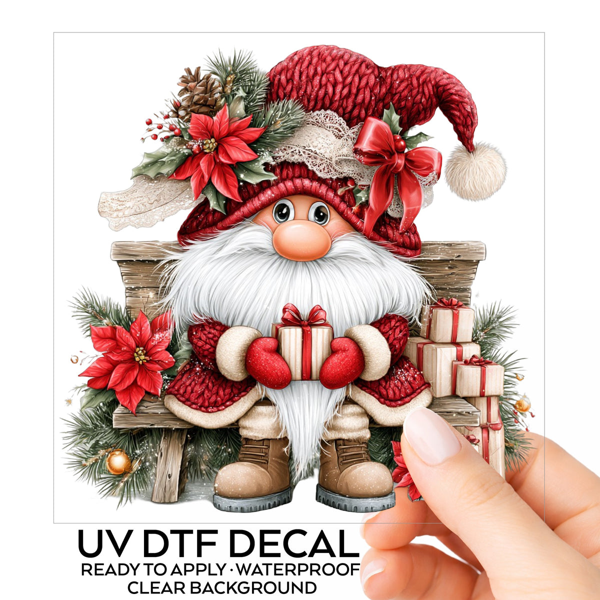 Gnome On Wooden Bench With Gifts UV DTF sticker on its backing card, held in hand