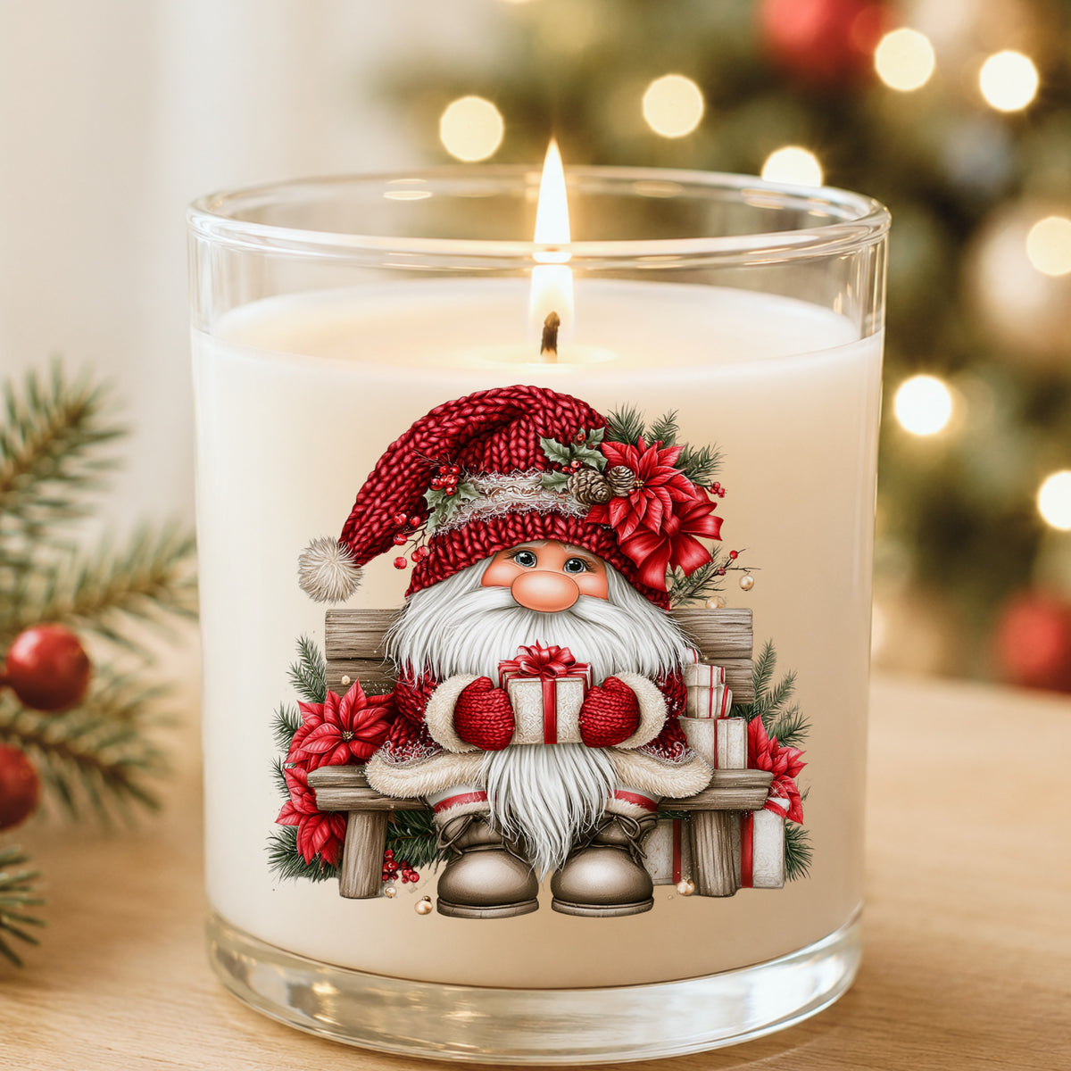 Gnome Sitting On Bench With Poinsettias UV DTF sticker applied to a white candle in a glass holder near Christmas lights
