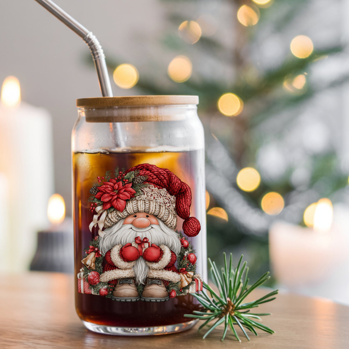 Gnome With Gold Bells And Cream Hat UV DTF sticker applied to a glass can cup of iced coffee with a straw