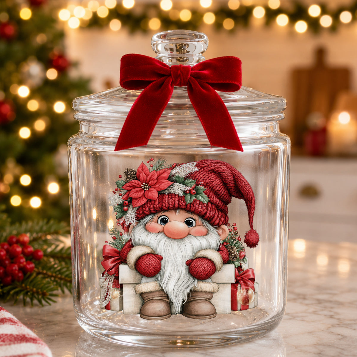 Gnome Sitting On Gift Boxes UV DTF sticker applied to a glass candy jar tied with a red bow
