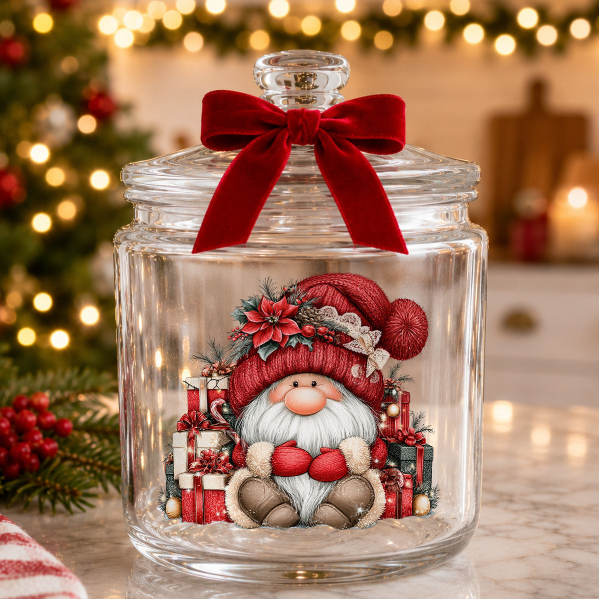 Gnome With Pile Of Presents UV DTF sticker applied to a glass candy jar tied with a red bow
