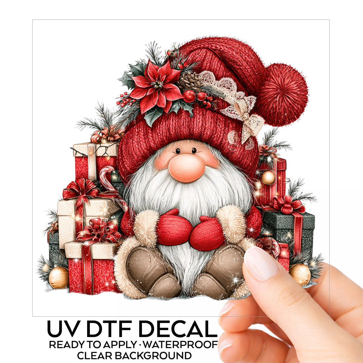 Gnome With Pile Of Presents UV DTF sticker on its backing card, held in hand