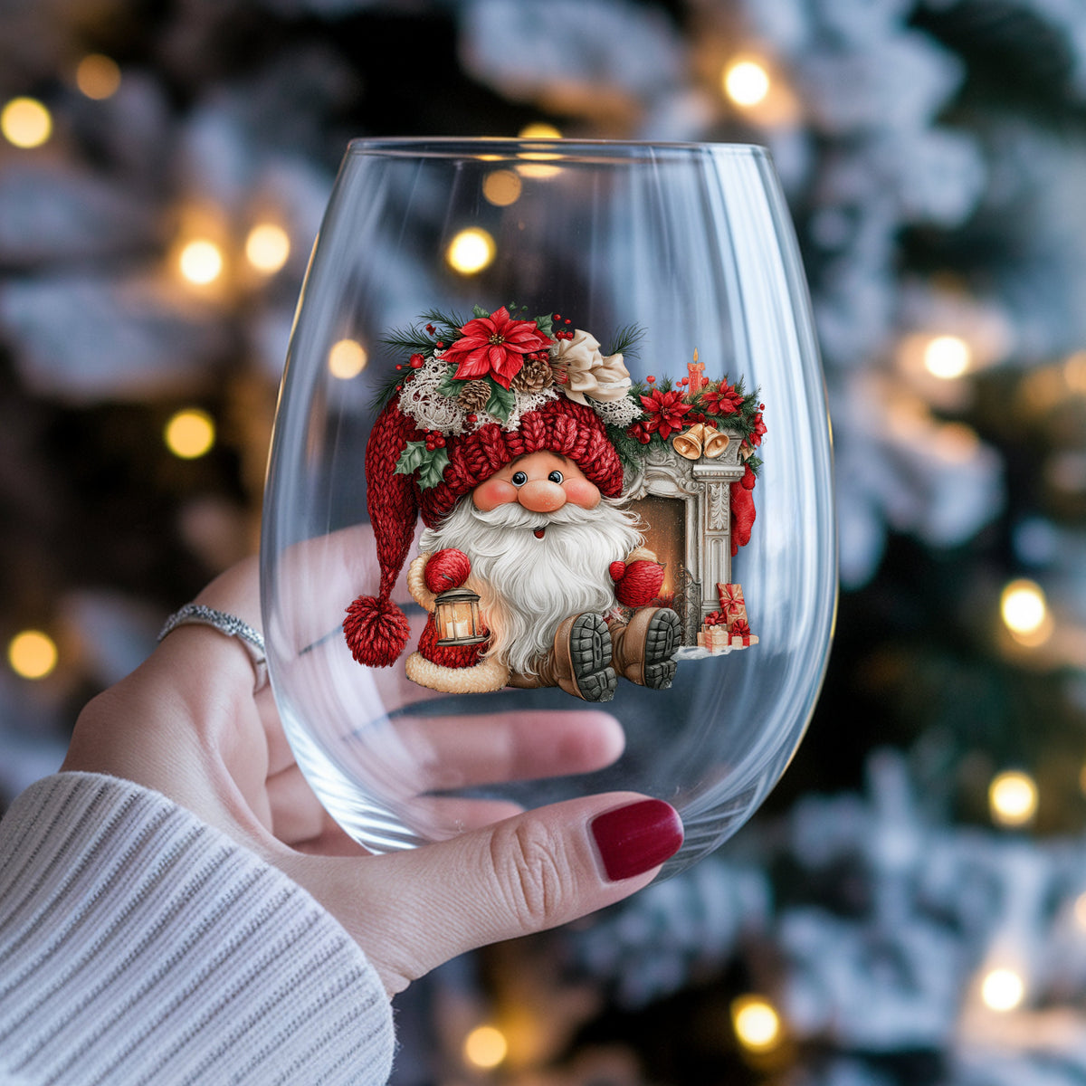 Gnome By Fireplace Mantel UV DTF sticker applied to a stemless wine glass held in hand
