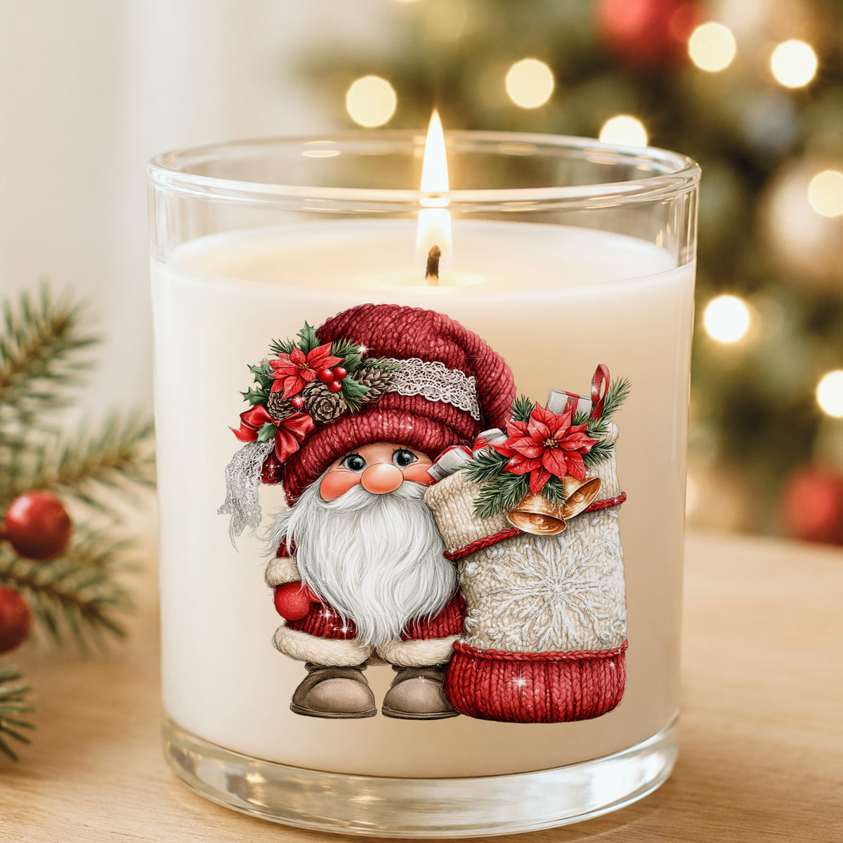 Gnome With Knit Christmas Stocking UV DTF sticker applied to a white candle in a glass holder near Christmas lights