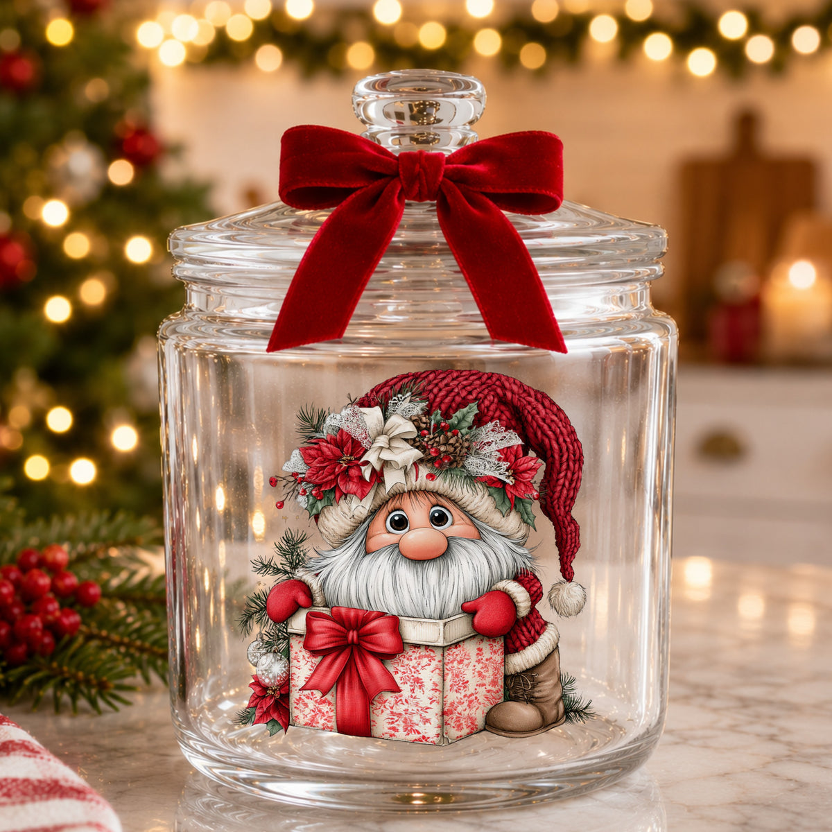 Gnome Peeking From Gift Box UV DTF sticker applied to a glass candy jar tied with a red bow