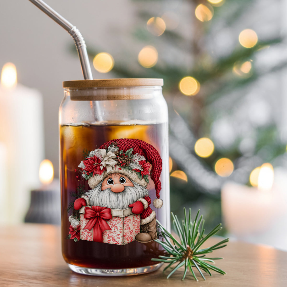 Gnome Peeking From Gift Box UV DTF sticker applied to a glass can cup of iced coffee with a straw