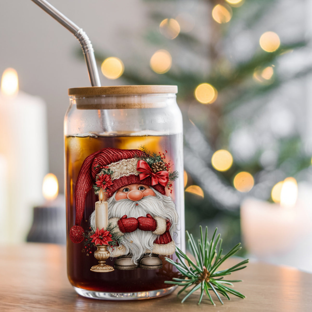Gnome With Candle UV DTF sticker applied to a glass can cup of iced coffee with a straw