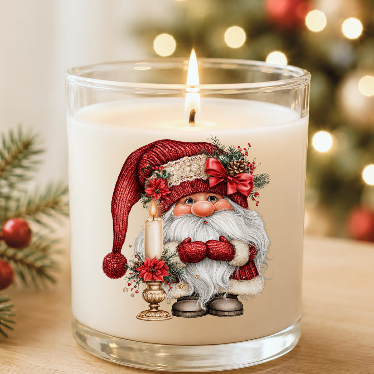 Gnome With Candle UV DTF sticker applied to a white candle in a glass holder near Christmas lights