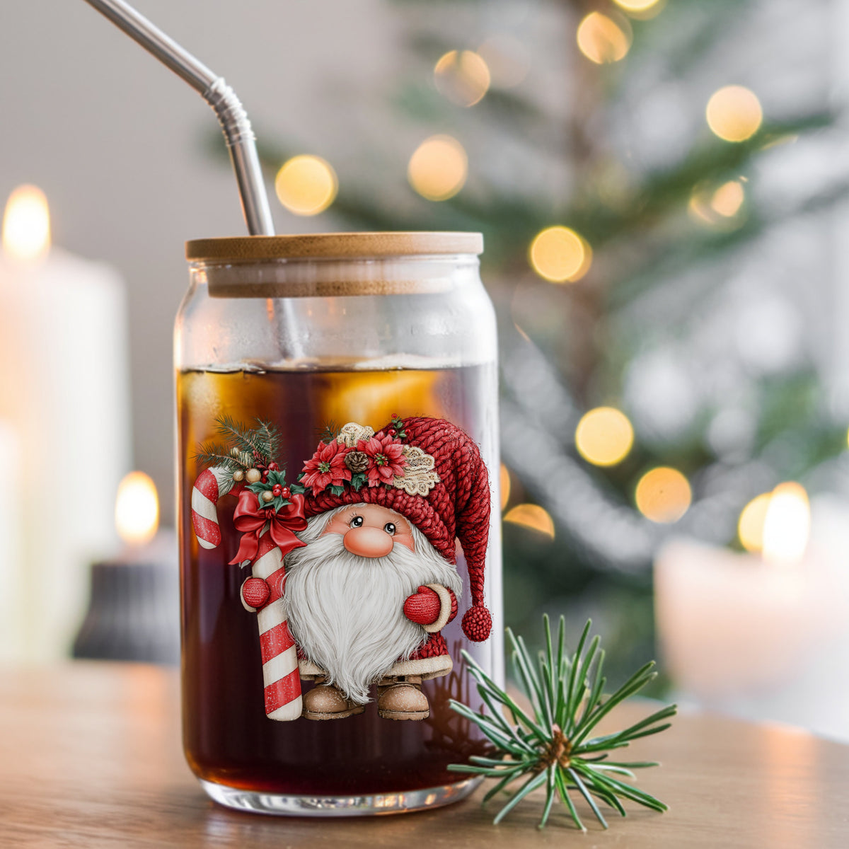 Candy Cane Gnome UV DTF sticker applied to a glass can cup of iced coffee with a straw
