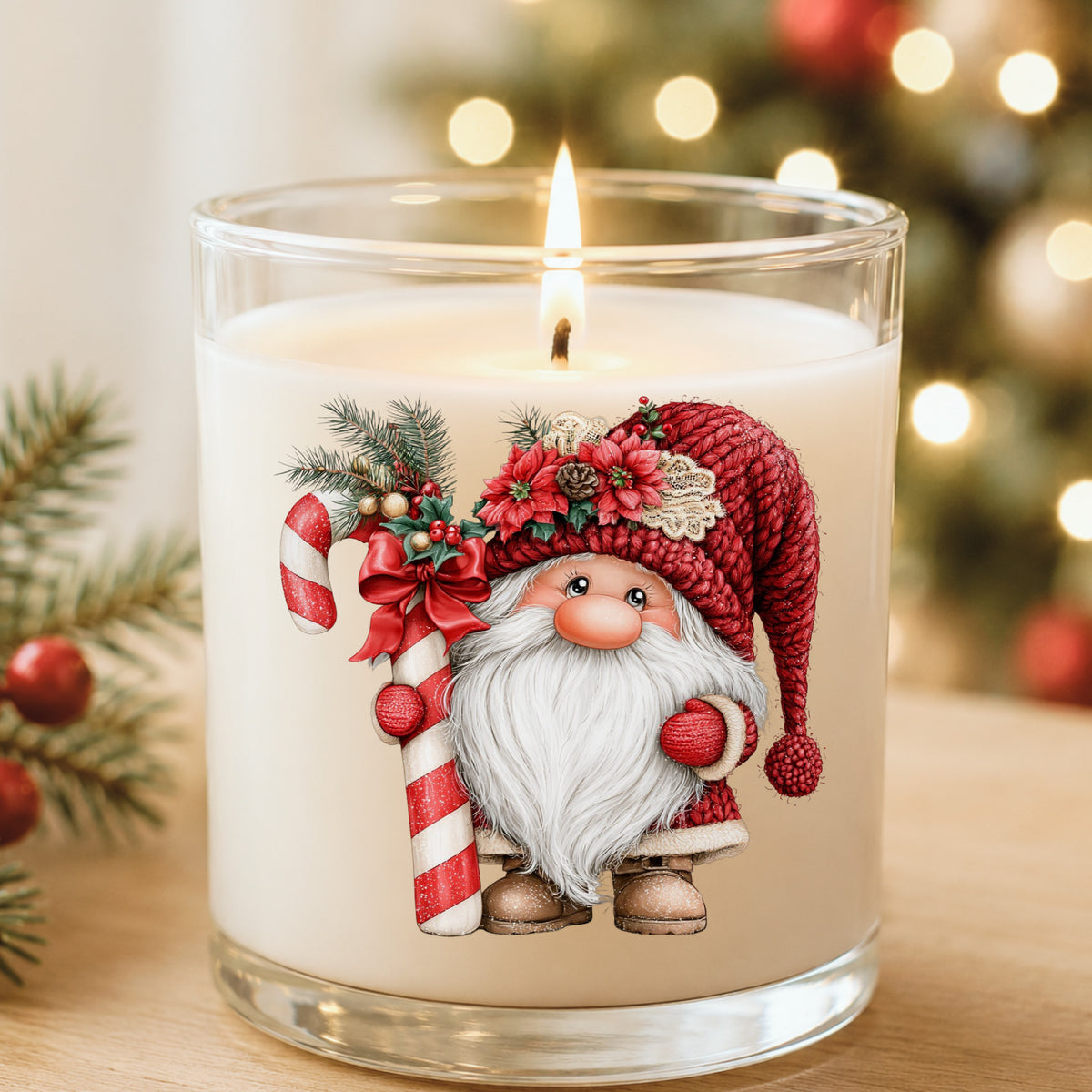 Candy Cane Gnome UV DTF sticker applied to a white candle in a glass holder near Christmas lights