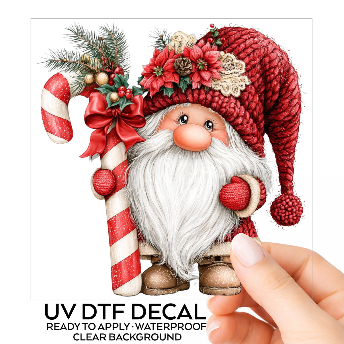 Candy Cane Gnome UV DTF sticker on its backing card, held in hand