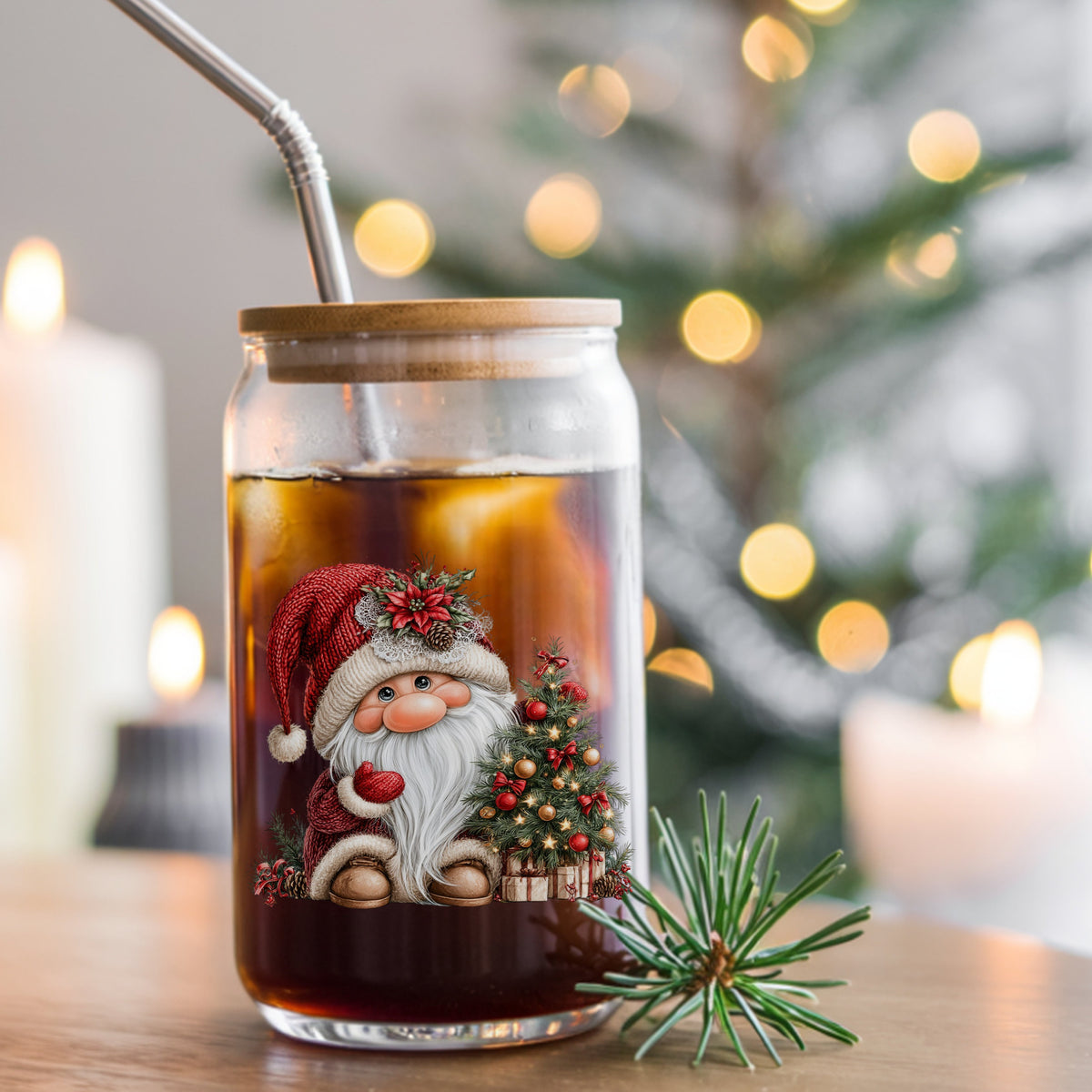Gnome With Decorated Christmas Tree UV DTF sticker applied to a glass can cup of iced coffee with a straw