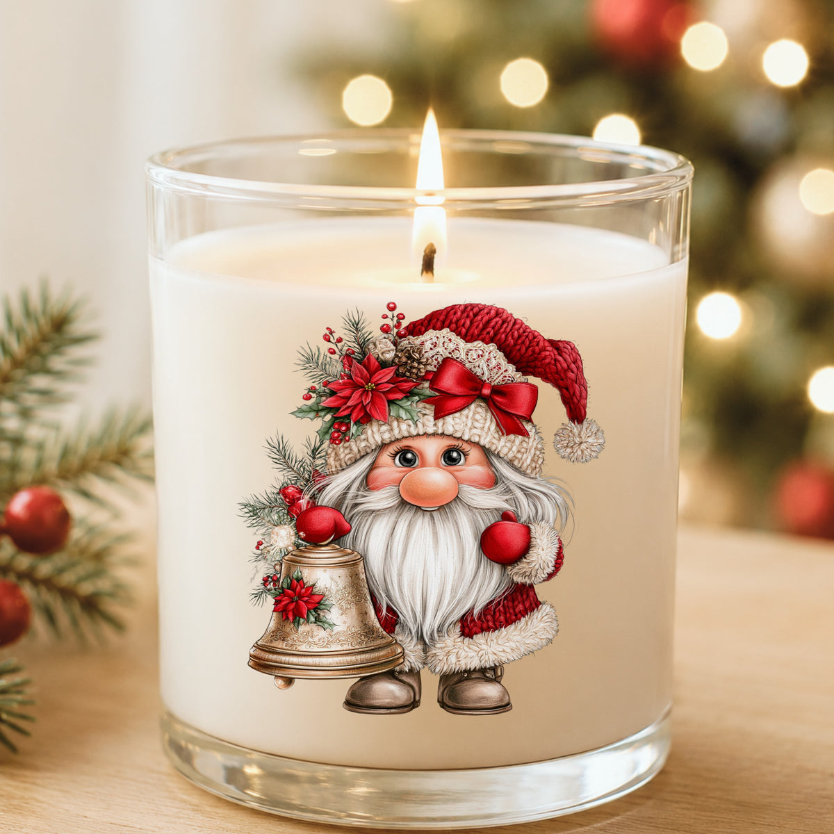 Gnome With Brass Bell UV DTF sticker applied to a white candle in a glass holder near Christmas lights